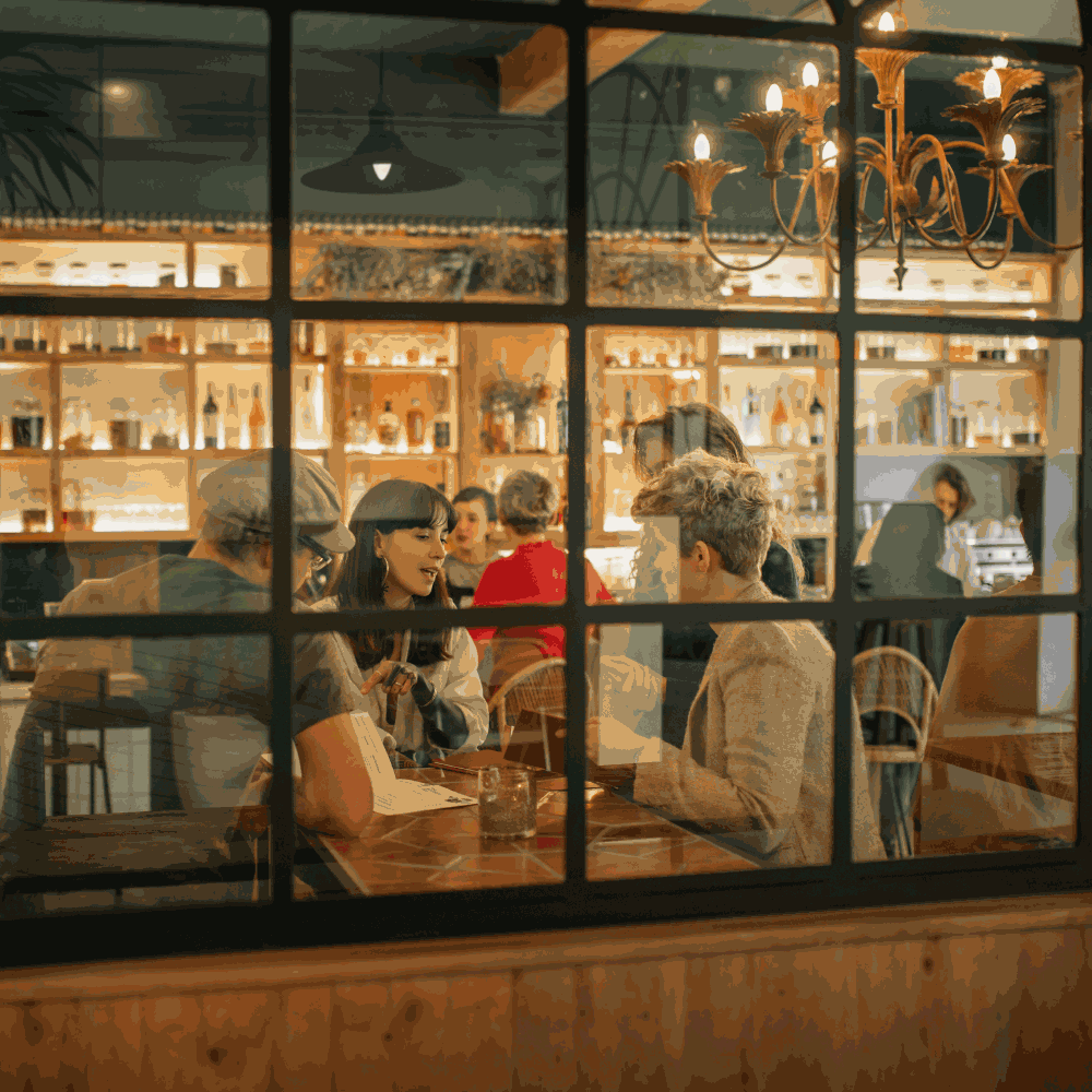 Etched and frosted vinyl applied to café windows, creating a soft privacy effect while allowing natural light