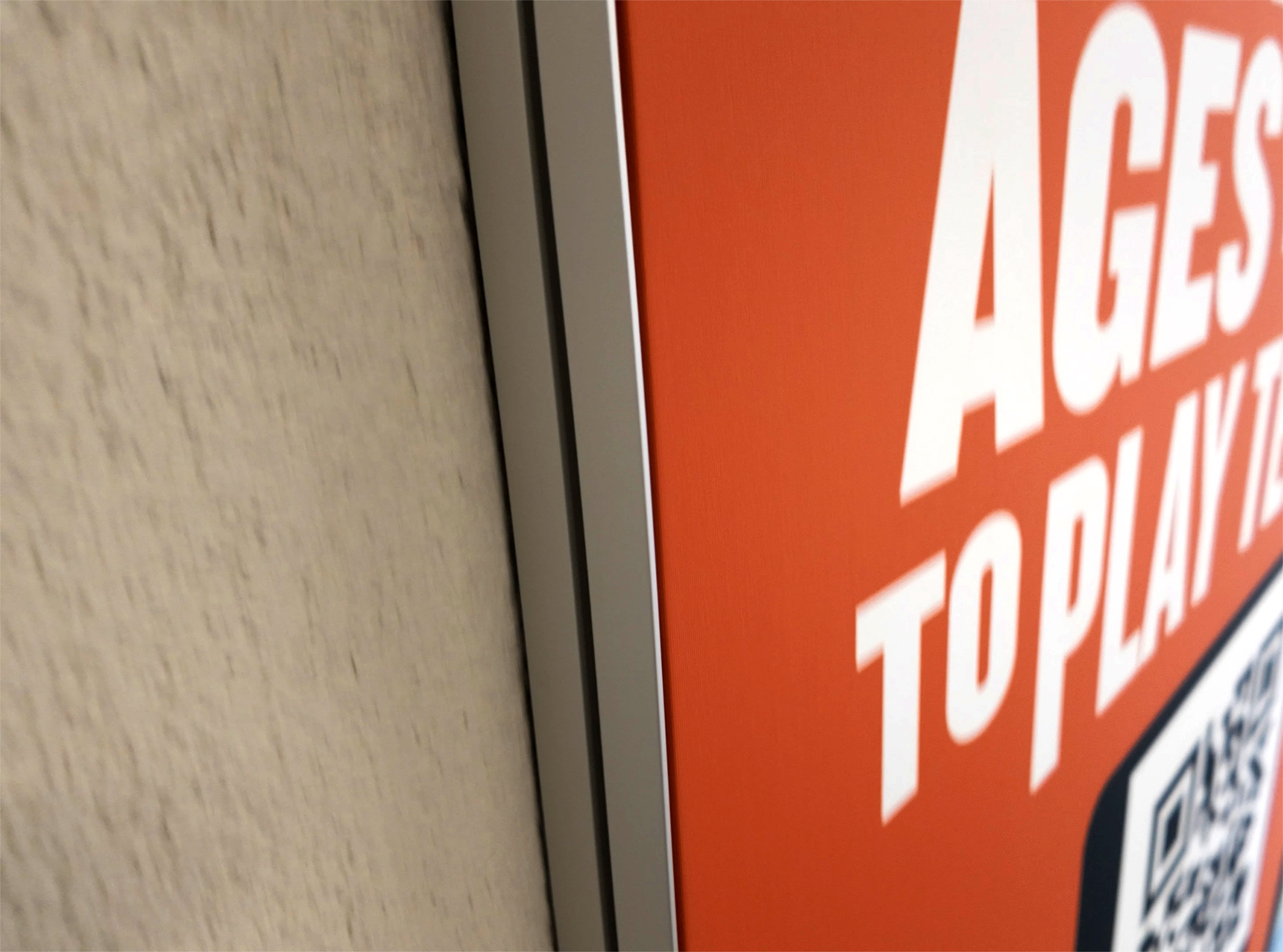 Close-up of the LTA Youth campaign fabric light box panel installed at Devonshire Park Tennis Centre in Eastbourne, printed by Beautiful LFP.