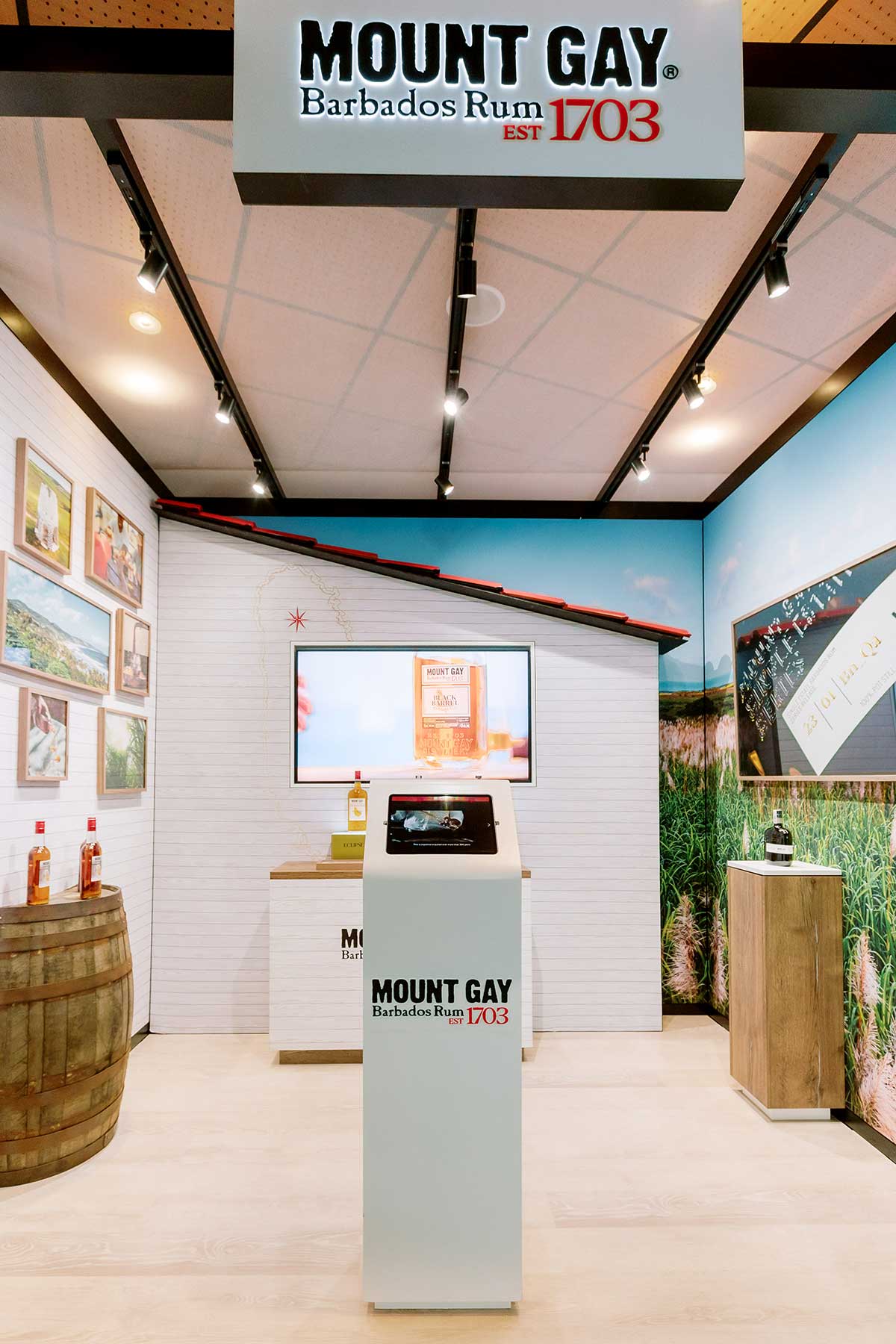 Mount Gay Rum exhibition stand with printed wall graphics and illuminated signage produced by Beautiful LFP for Rémy Cointreau in Cannes.