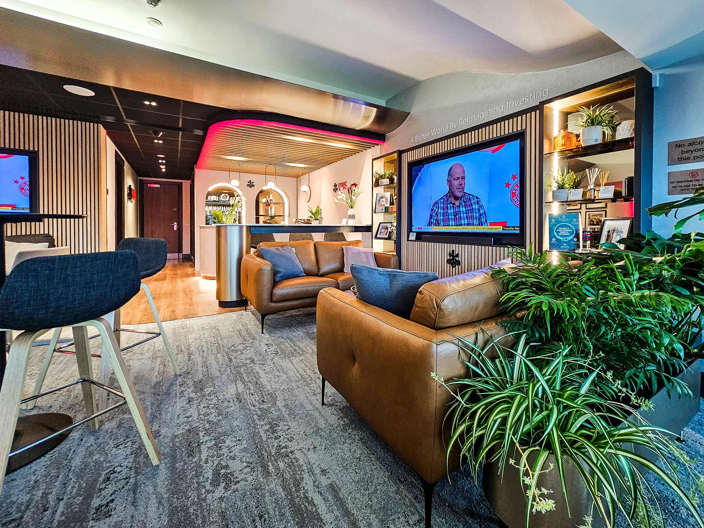 UBS VIP Lounge and bar area at Chelsea FC’s Stamford Bridge, featuring custom-printed interiors, premium signage, and luxury seating by Beautiful LFP.