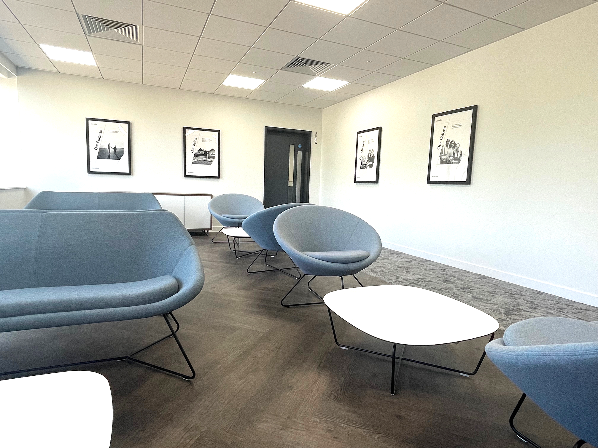 Schüco UK branded waiting area and reception seating following office interior refurbishment in Milton Keynes